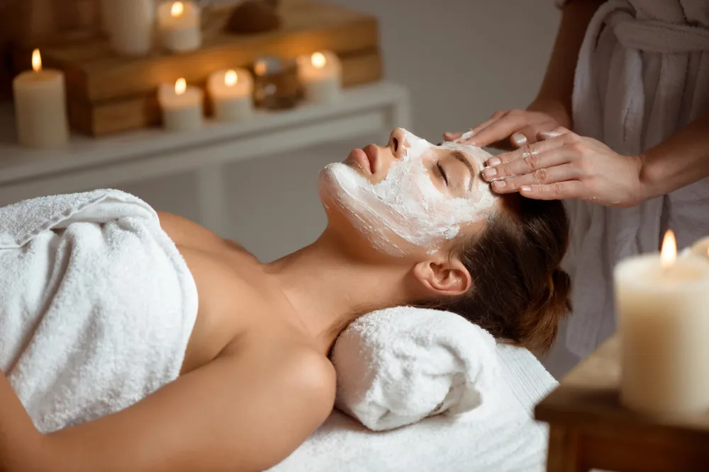 Woman receiving a deep cleansing facial near Woodside and Sunnyside Queens
