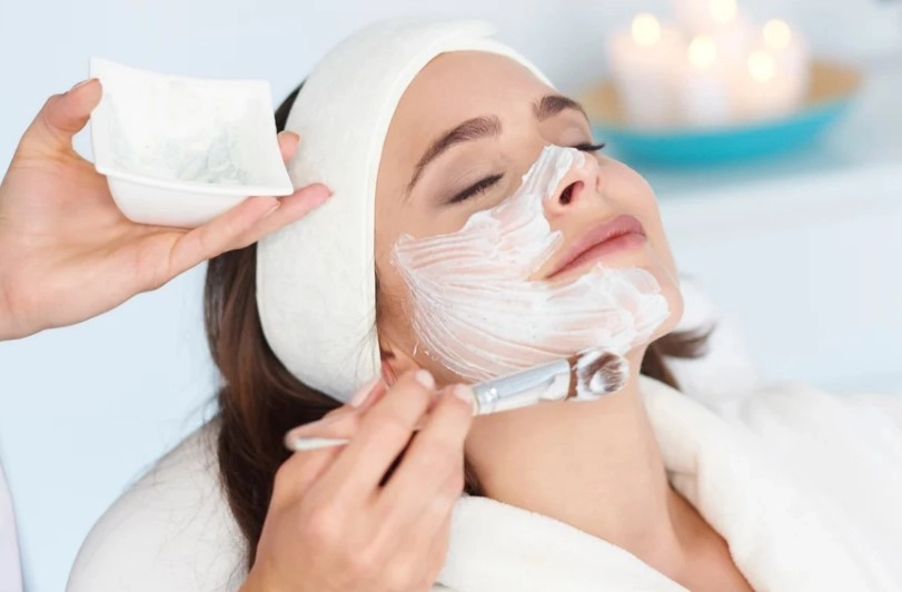 Relaxing spa facial mask application for winter skin hydration